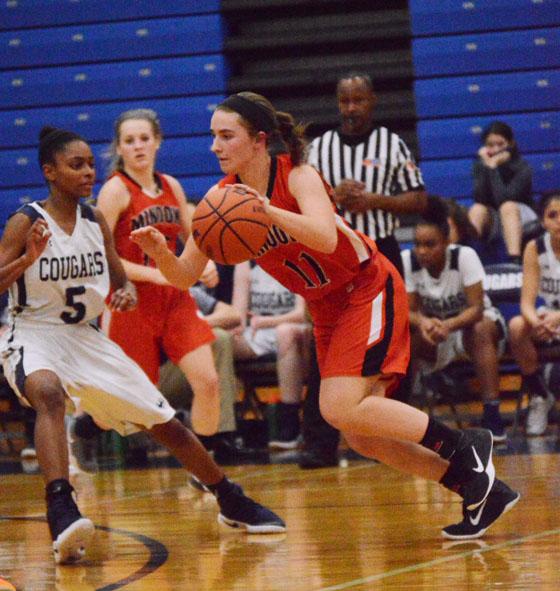 Hailey Arlis, senior, helps Minooka to defeat the Plainfield South Cougars 61-41, on Jan. 24 at Plainfield South High School.  