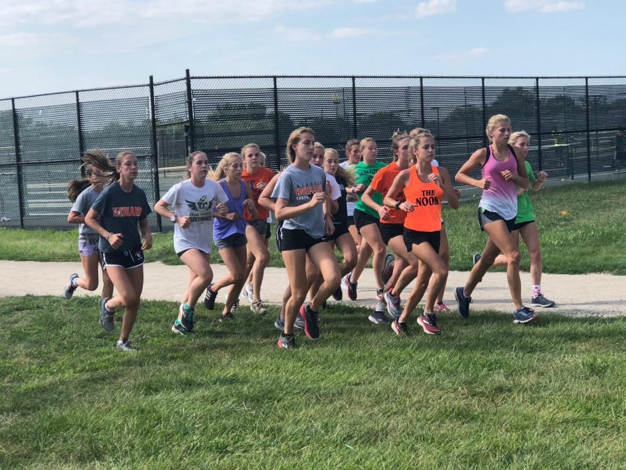 The+girls+cross+country+team+completes+a+workout+on+Aug.+23.+