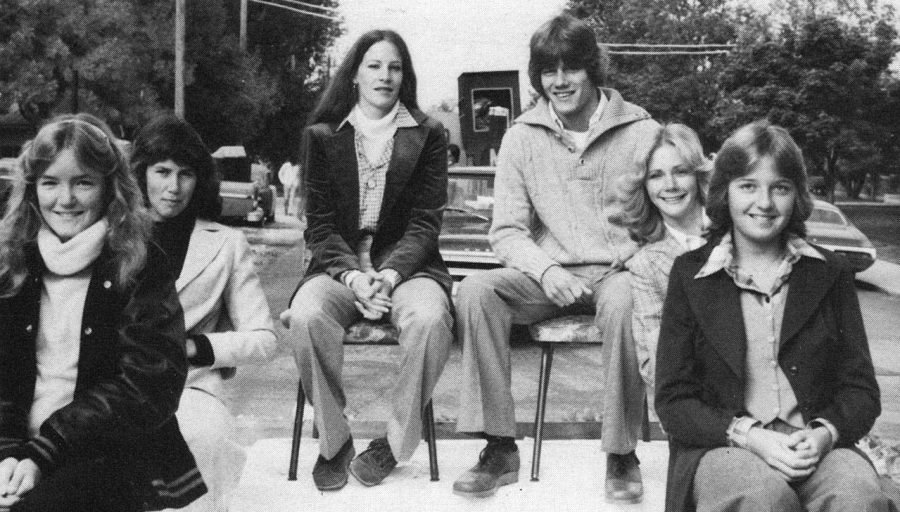 Students ride a float in the 1978 Minooka Homecoming Parade. 