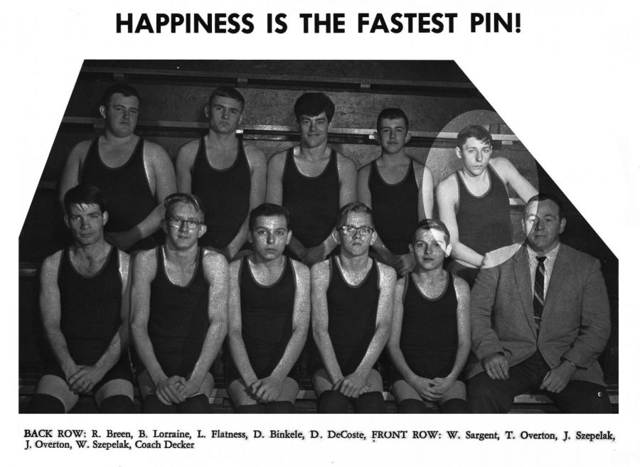 The 1965-66 wrestling team include David Anthony DeCoste, located in the back right. He died in the war, and later a wrestling award at Minooka was named for him. 