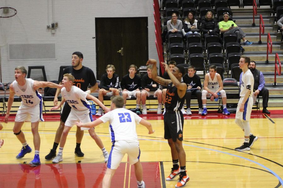 Senior DAnthony Thomas shoots a free throw against St. Charles North at North Central College.  The Stars beat the Indians 49-44. 