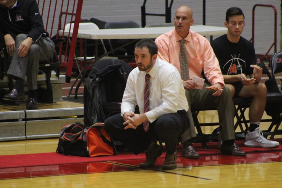 Head+coach+Kevin+Cain+and+the+varsity+boys+basketball+team+are+looking+for+their+first+win+of+the+season+tonight+against+Plainfield+South.+