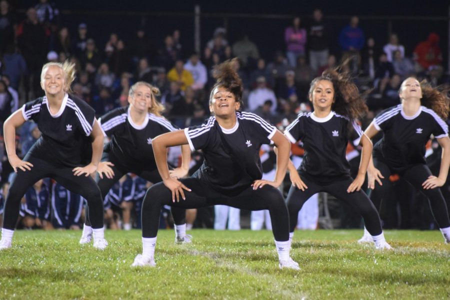 The varsity Arrowettes perform at a football game this fall. 