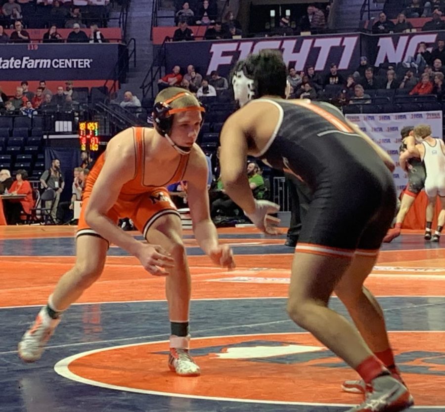 At the 2020 IHSA State Finals, Jack McClimon wrestles for Minooka. 