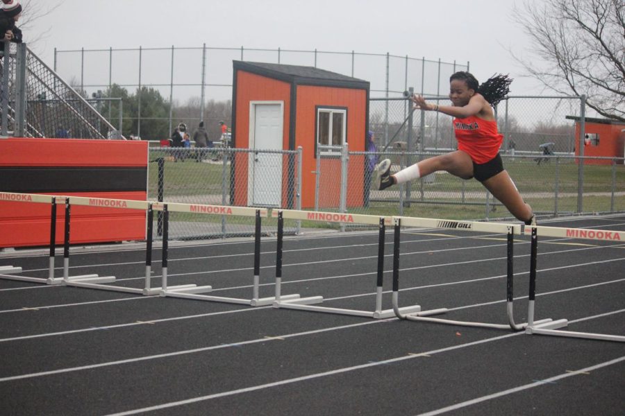 Freshman+Bre+Edwards+wins+the+300-meter+low+hurdles+in+a+triangular+meet+against+Plainfield+North+and+Romeoville+on+April+12.+