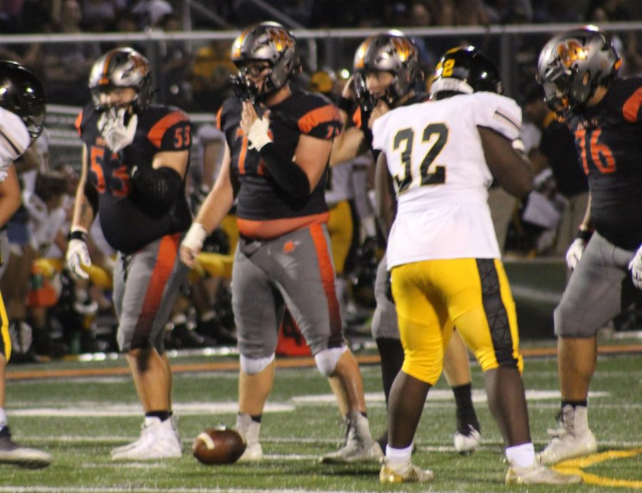 Minookas+offensive+line+helped+the+team+rush+for+259+yards+in+a+win+over+Joliet+West+on+Sept.+2.++Carter+Gessner%2C+Ryan+Susnar%2C+and+Jeremy+Marrero+are+seen+here+with+quarterback+Gavin+Dooley.+