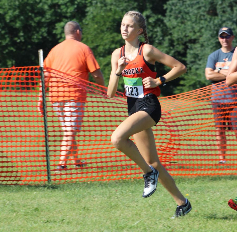 Sophomore Cassie Brushaber races at the Normal West Invitational early in the season.  Brushaber won flight 6 of the Minooka Flight Invite on Sept. 17 to help the varsity girls to a victory. 
