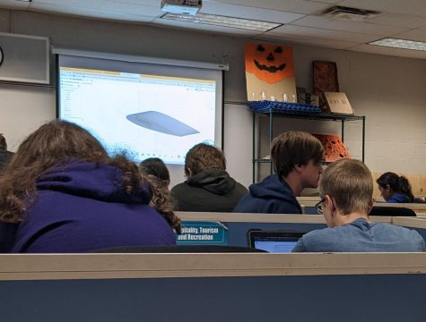 Mr. Nick Barello teaches Aerospace Engineering to students in room 483 at Central Campus on Oct. 5