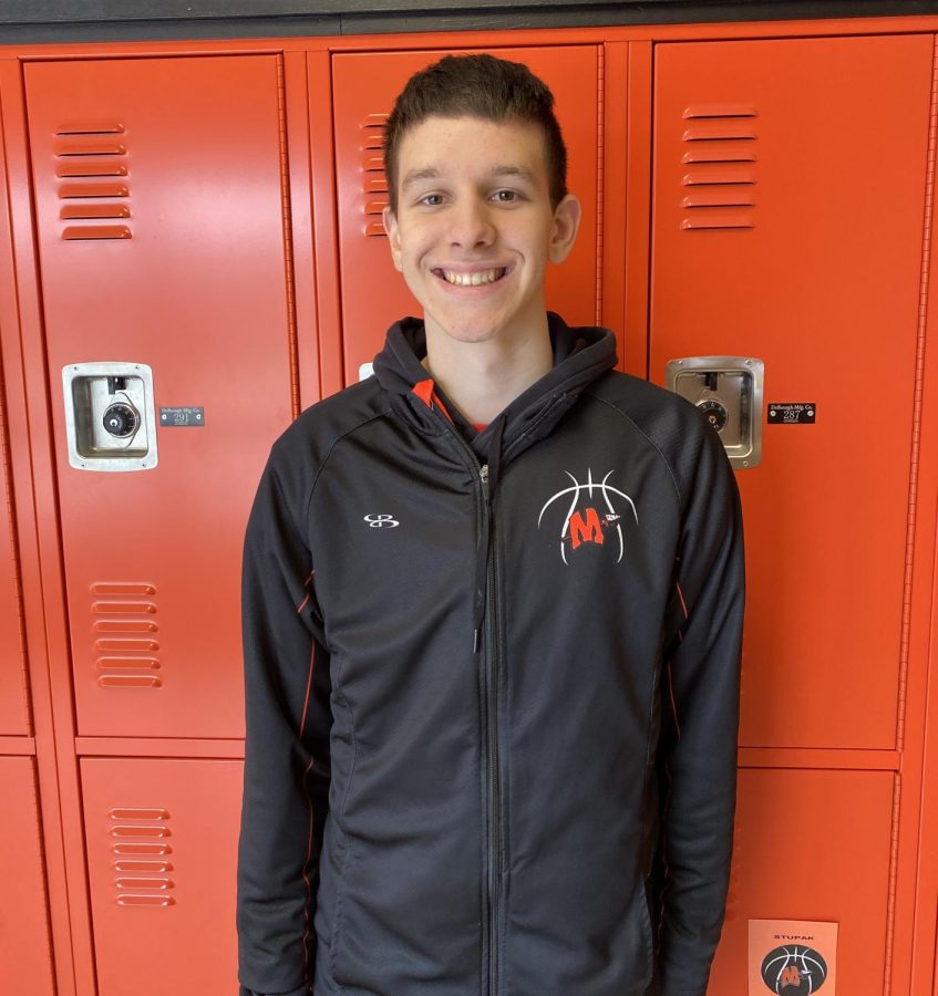 Silas Slavik is a point guard on the varsity basketball team. 