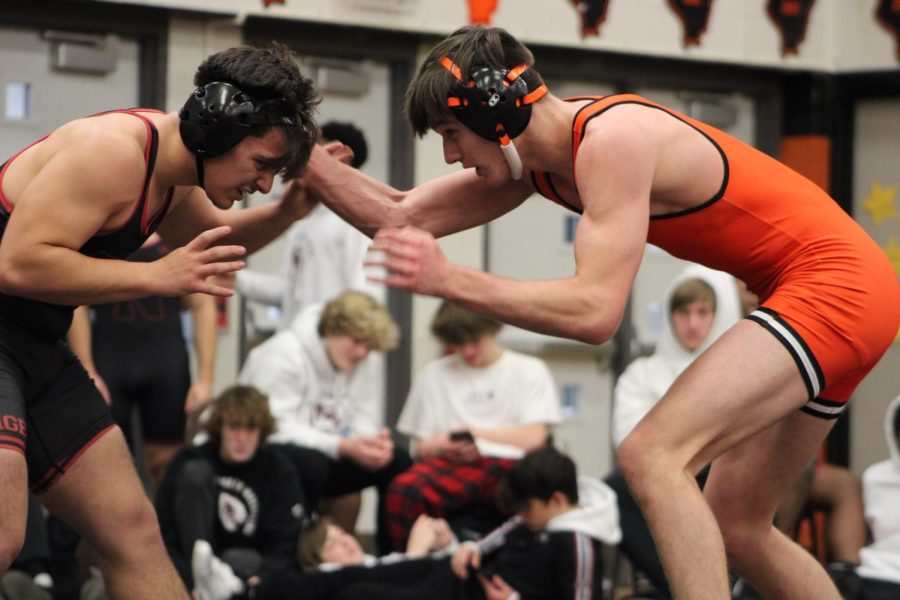 Senior Cody Pelton wrestles in an early season match against Plainfield North. 