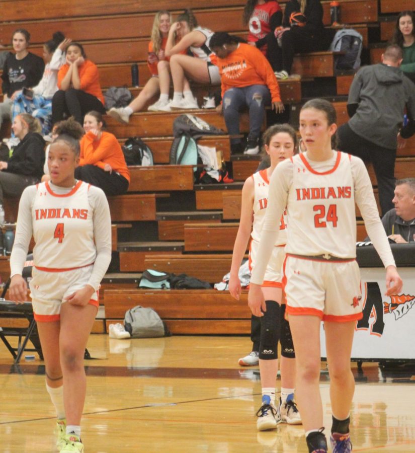 Junior Makenzie Brass and freshman Madelyn Kiper take the court against Joliet Central on Jan. 19. Brass and Kiper both had double digit points and five plus rebounds against Plainfield North.