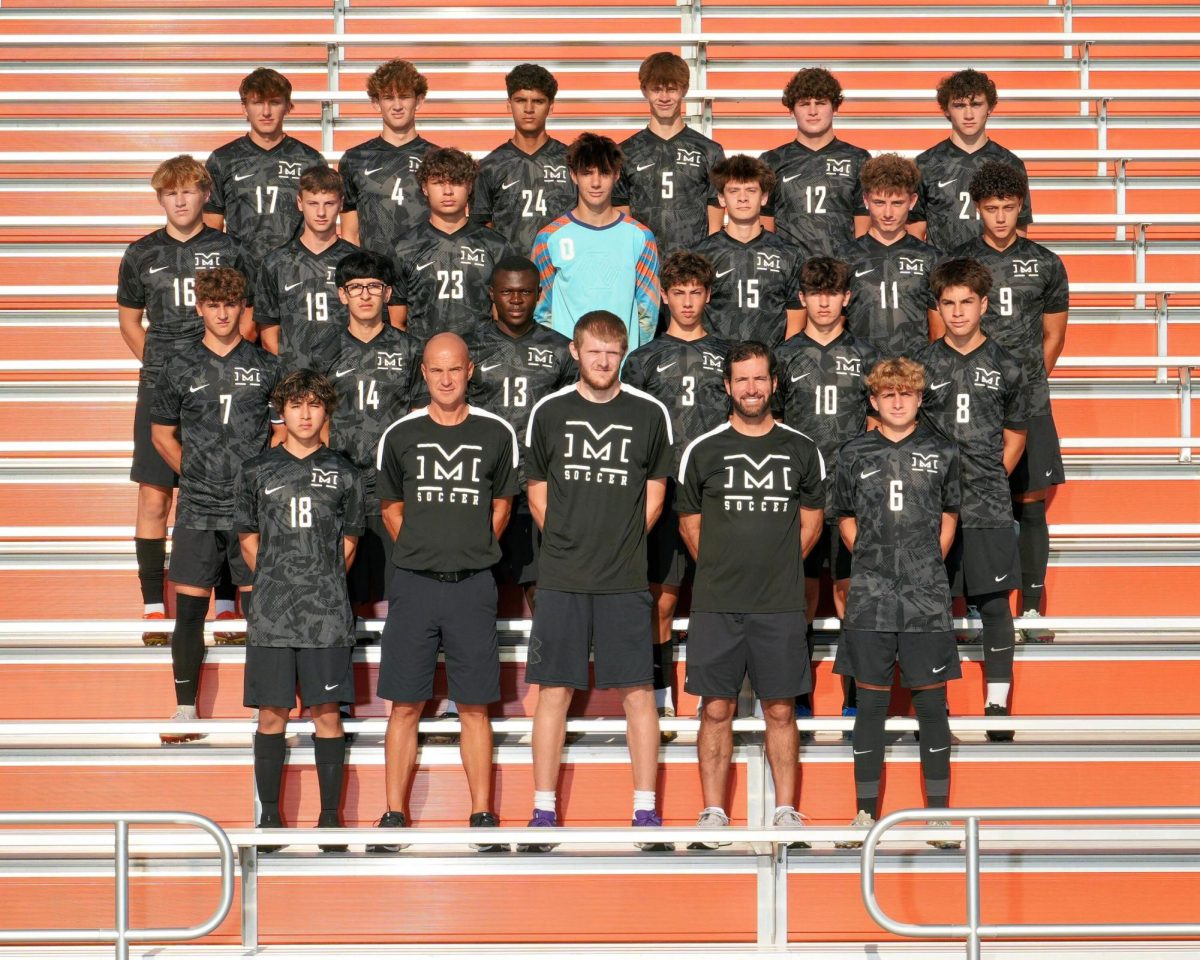 The varsity boys soccer team is coached by Nate Spriggs. 