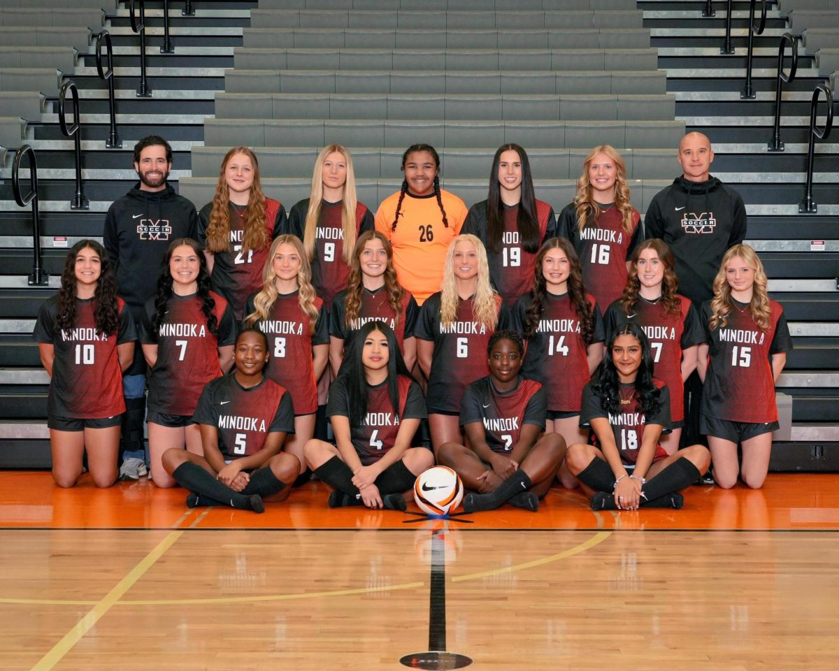 The head coach of the varsity girls soccer team is Chris Brolley. 
